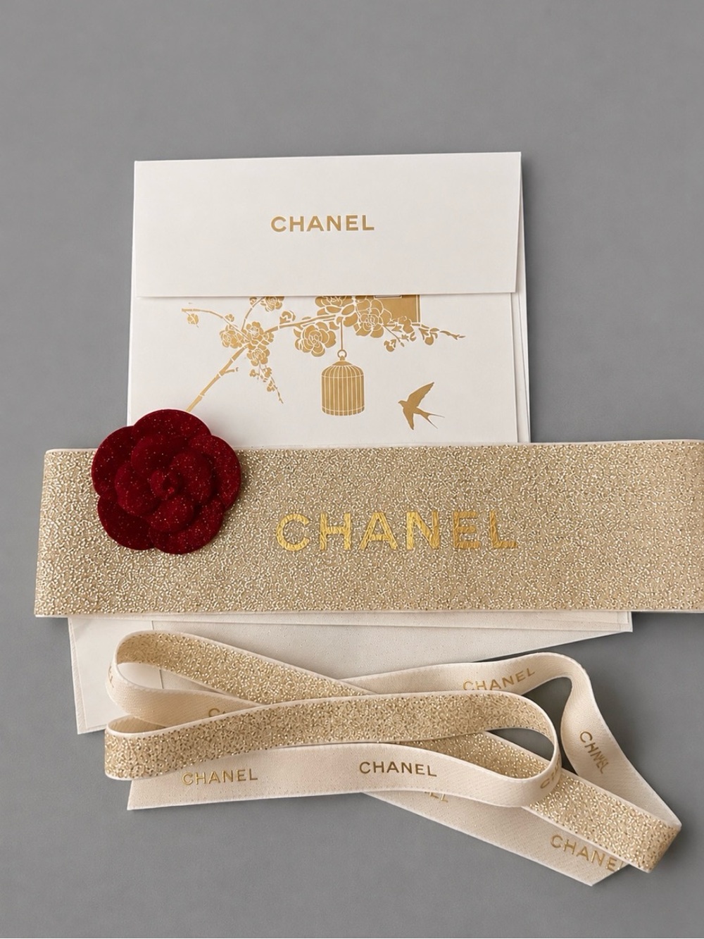 CHANEL 2021 Holiday Card Red Camellia Sticker 
Gold Belly Band & Ribbon
